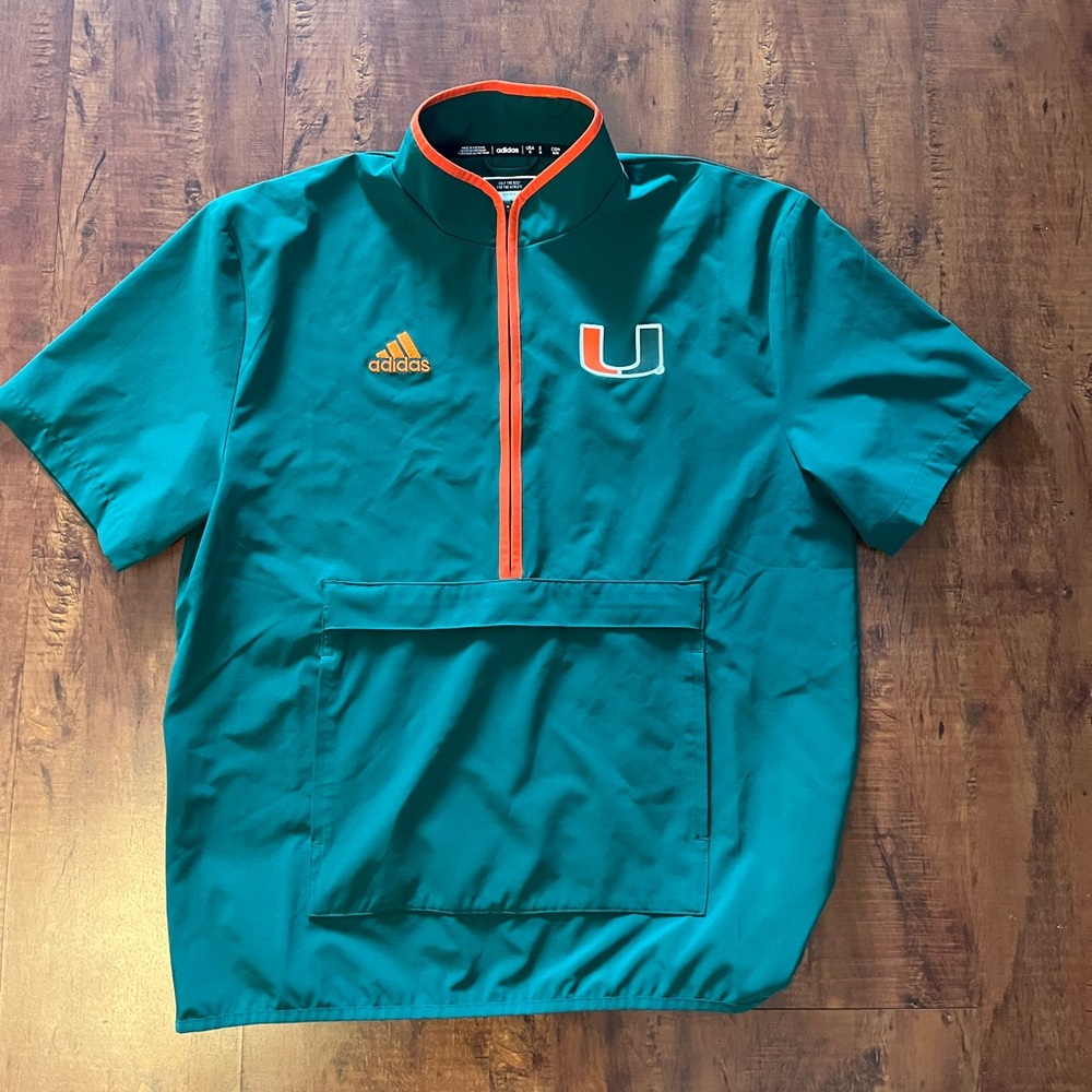 Adidas x University of Miami Exclusive. Short Sleeve Quarter-Zip Windbreaker.